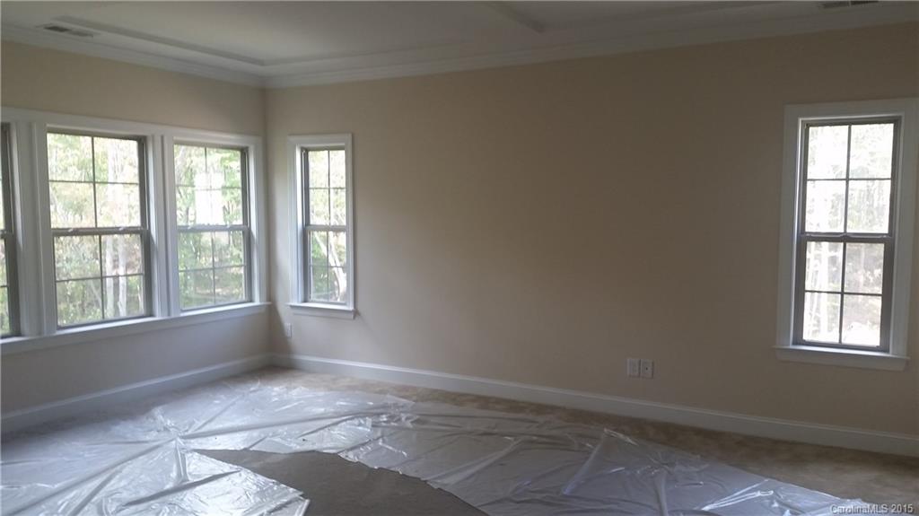 720 Chase Court, Unit 123 Fort Mill, SC 29708 - Photo 8 of 19 an empty room with windows