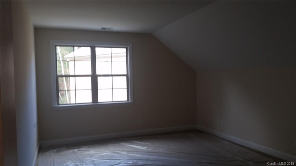 720 Chase Court, Unit 123 Fort Mill, SC 29708 - Photo 10 of 19 an empty room with a window