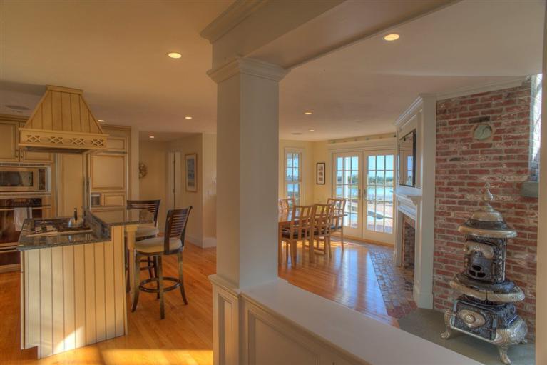 500 Elliott Road Centerville, MA 02632 - Photo 14 of 35 a workspace with furniture and a floor to ceiling window
