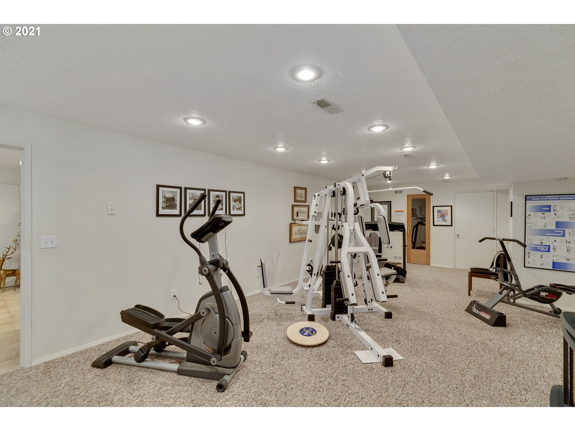 201 Northeast Salzman Road Corbett, OR 97019 - Photo 20 of 32 a view of a room with gym equipment