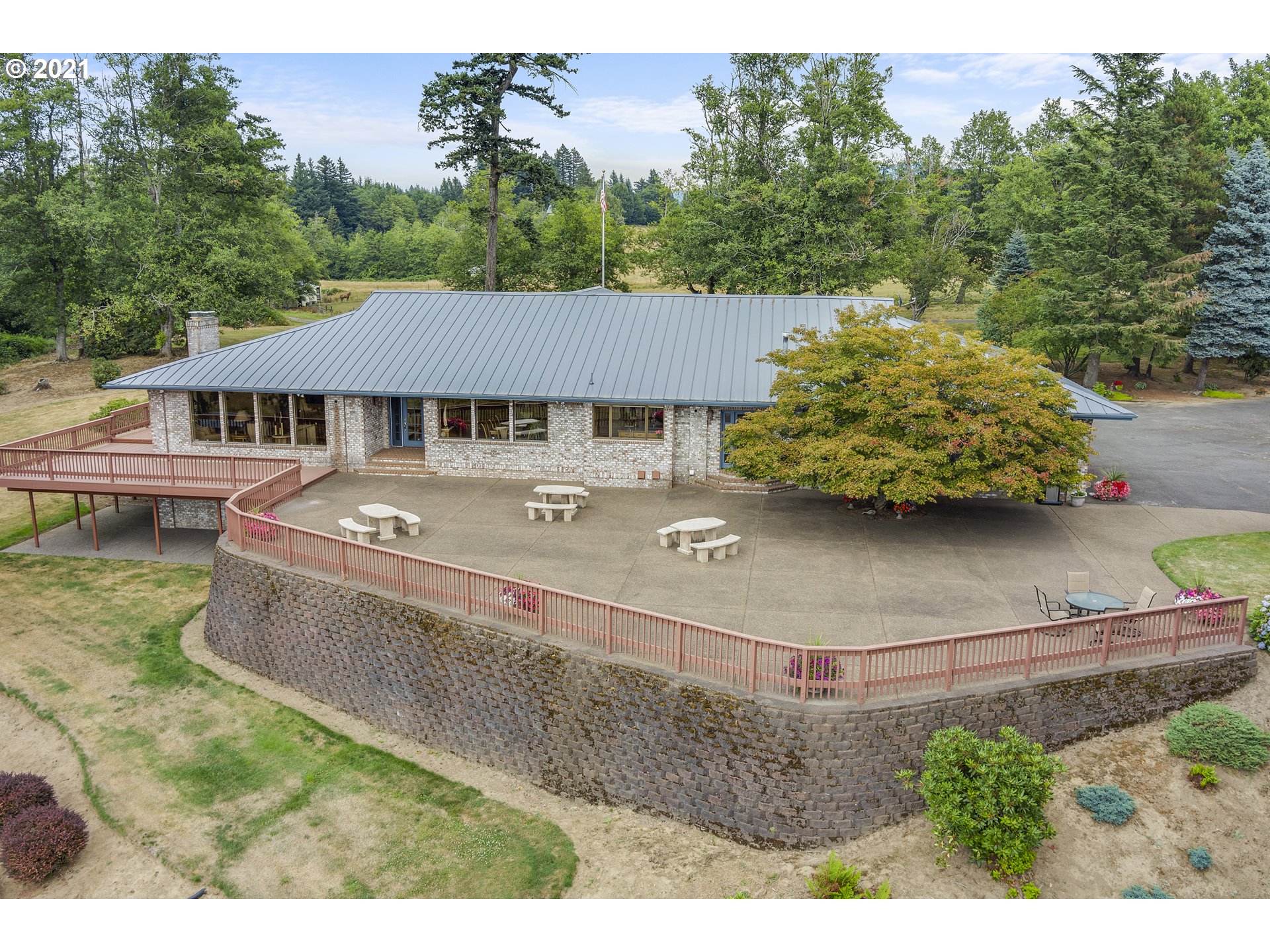 201 Northeast Salzman Road Corbett, OR 97019 - Photo 25 of 32 an aerial view of a house with swimming pool and trees