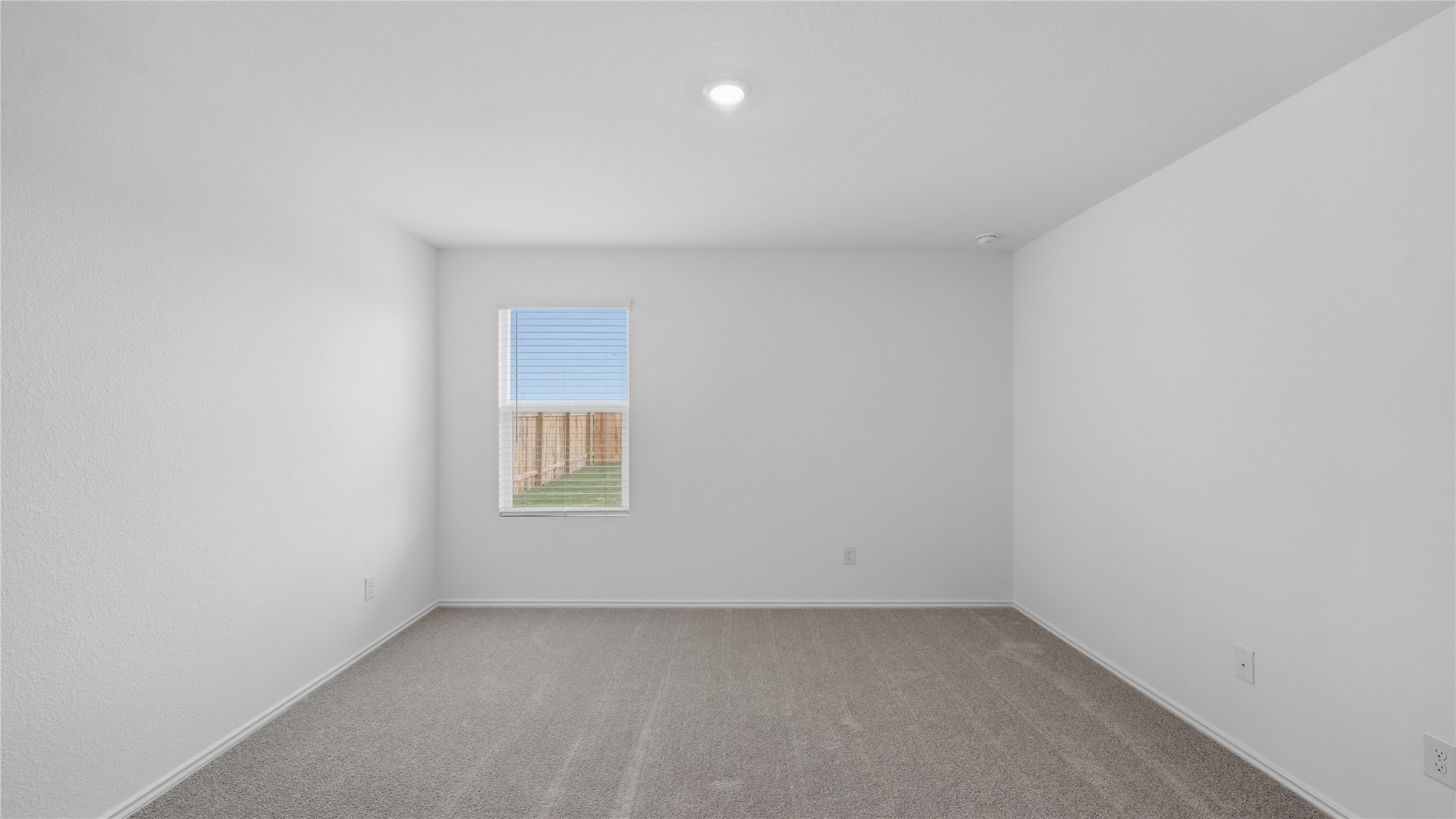 221 Stumpy Street San Marcos, TX 78666 - Photo 13 of 35 an empty room with a window