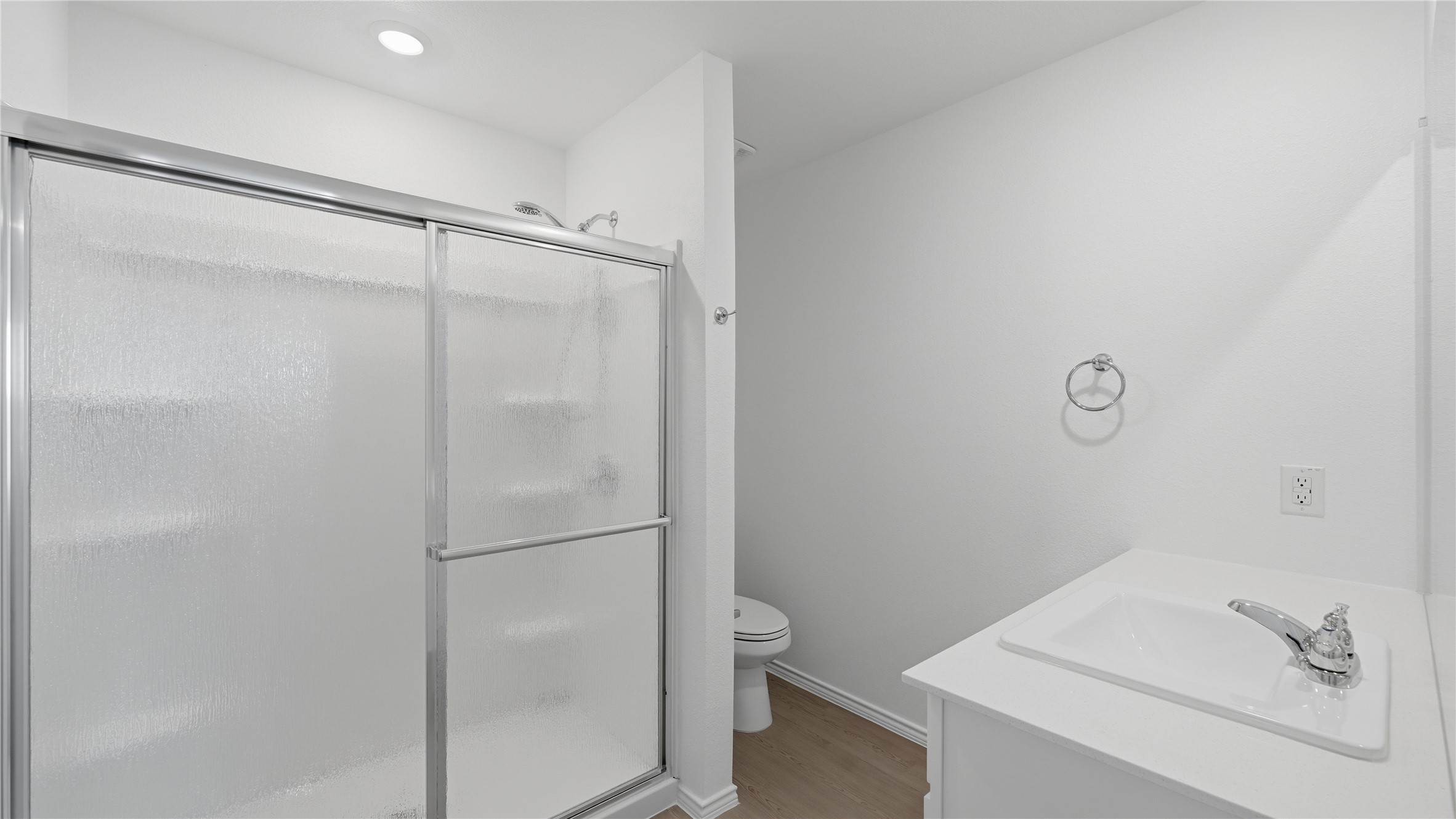 221 Stumpy Street San Marcos, TX 78666 - Photo 18 of 35 a bathroom with a granite countertop shower and a sink