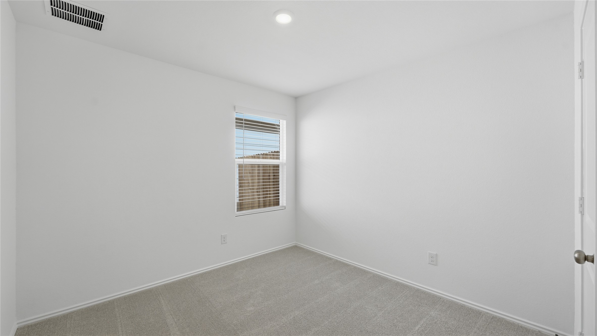 221 Stumpy Street San Marcos, TX 78666 - Photo 22 of 35 a view of an empty room with a window