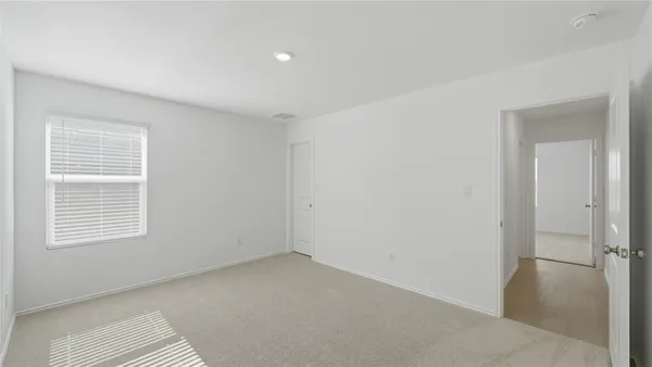 a view of a room that has a window in it