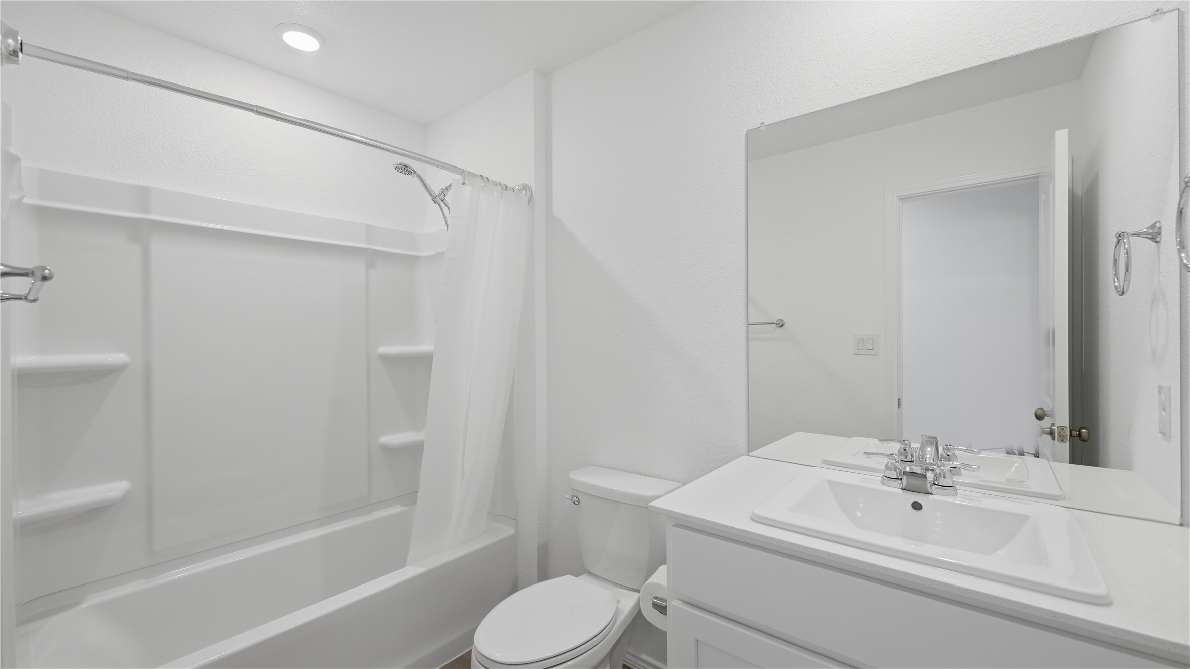 221 Stumpy Street San Marcos, TX 78666 - Photo 26 of 35 a bathroom with a sink a toilet and shower