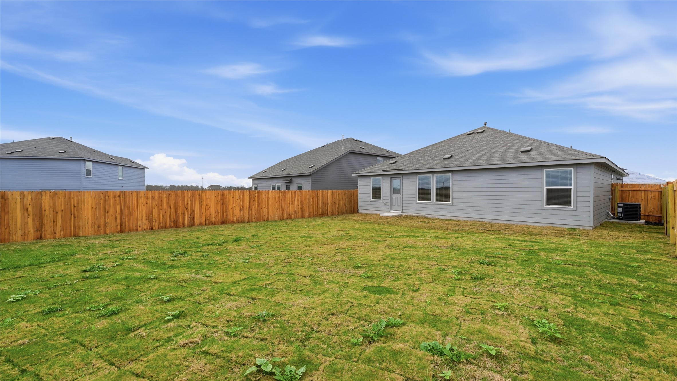 221 Stumpy Street San Marcos, TX 78666 - Photo 32 of 35 a front of a house with a yard