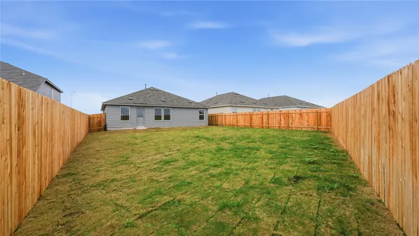 a front of a house with a yard