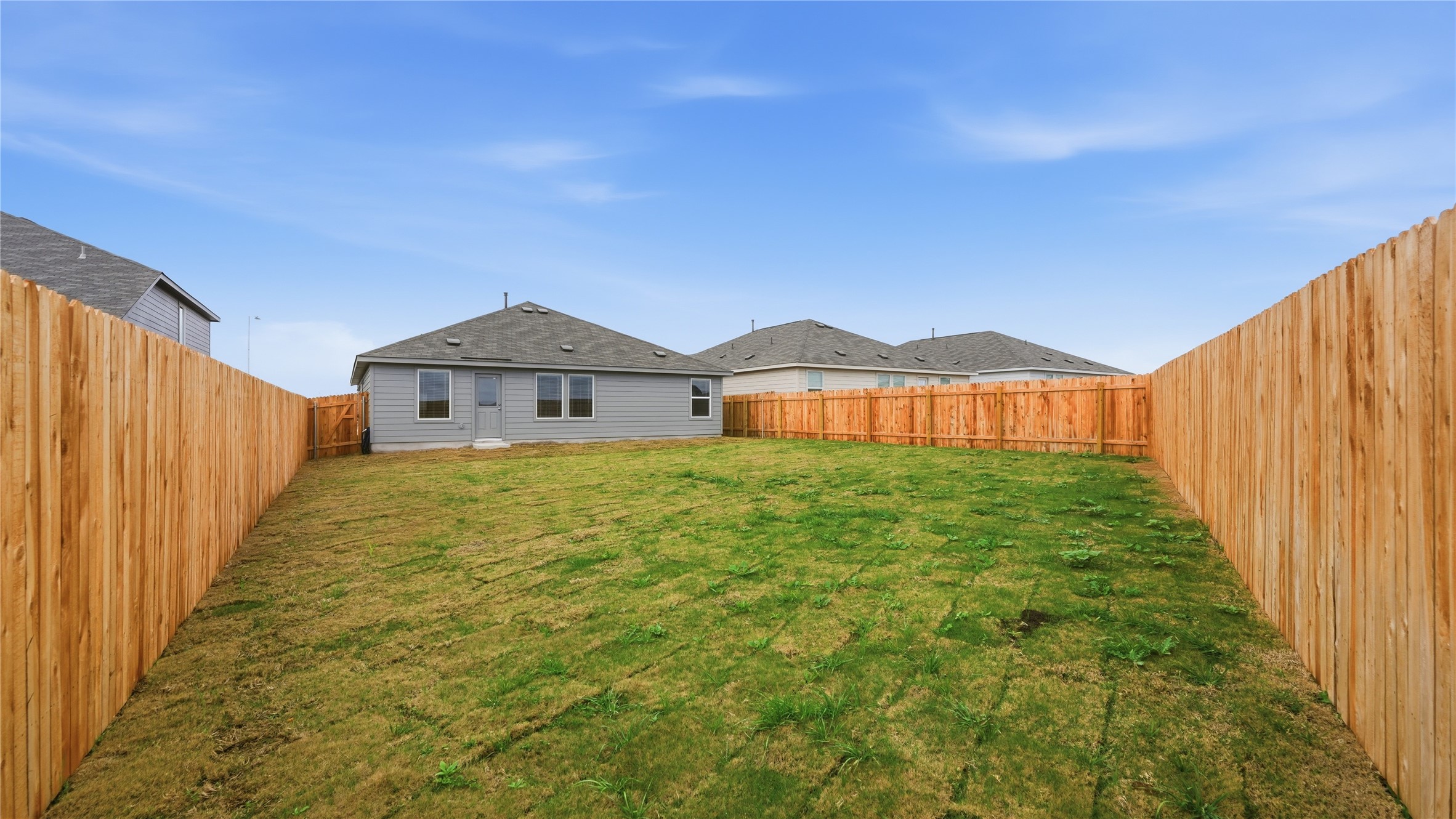 221 Stumpy Street San Marcos, TX 78666 - Photo 33 of 35 a front view of a house with garden
