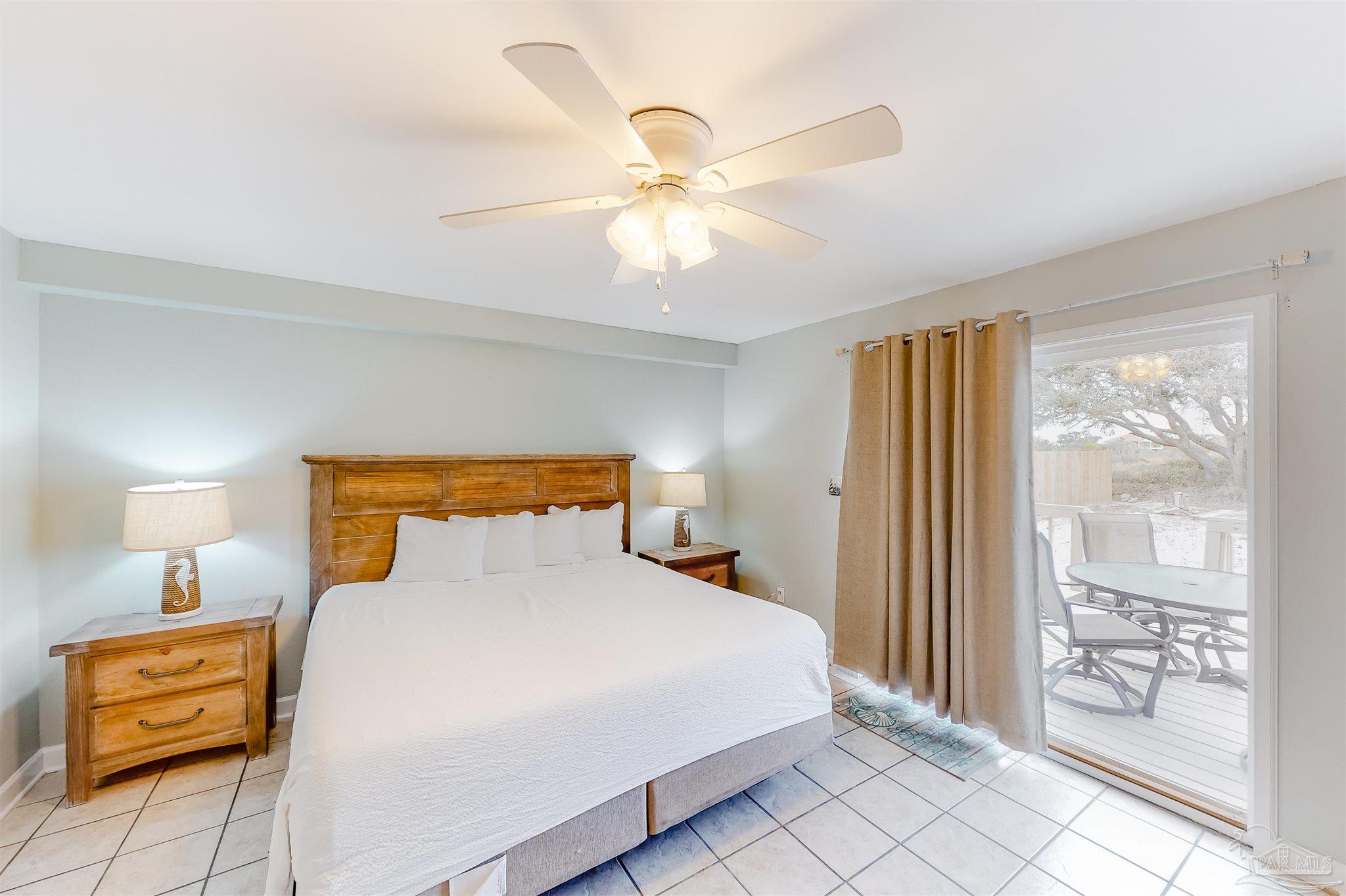 14580 Perdido Key Drive, Unit C3 Perdido Key, FL 32507 - Photo 10 of 17 a bedroom with a bed and a window