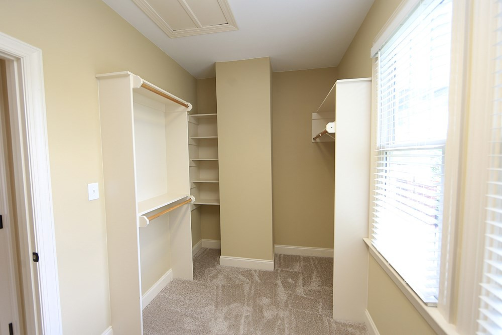 637 Competition Road Raleigh, NC 27603 - Photo 20 of 30 Wonderful walk in closet directly off of the Master Bath. Built ins are a nice touch. Walk-in Closet