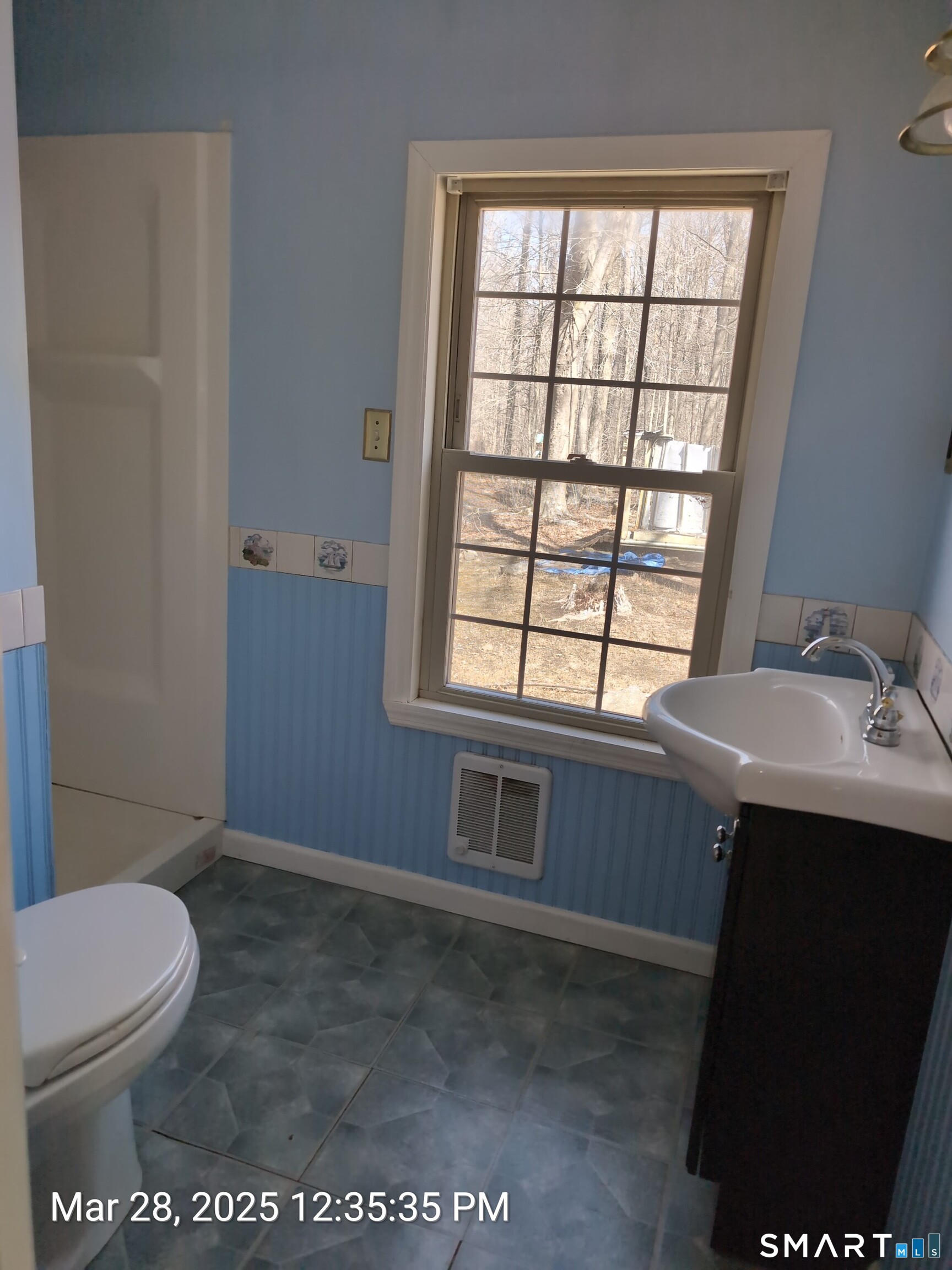 97 Bushy Hill Road Deep River, CT 06417 - Photo 26 of 28 a bathroom with a sink a toilet and window