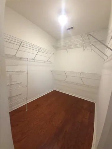 a view of a room with racks on the wall