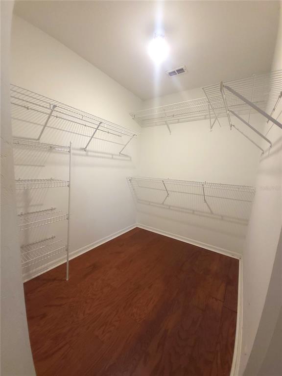 5909 Southwest 86th Drive Gainesville, FL 32608 - Photo 10 of 22 a view of a room with racks on the wall