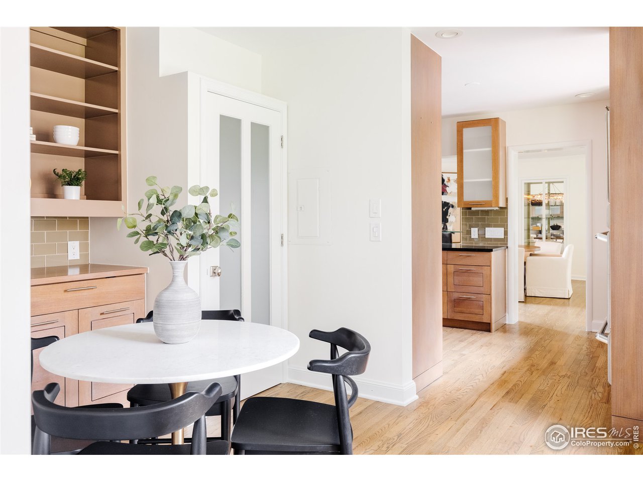 733 13th Street Boulder, CO 80302 - Photo 18 of 35 a dining room with furniture and wooden floor