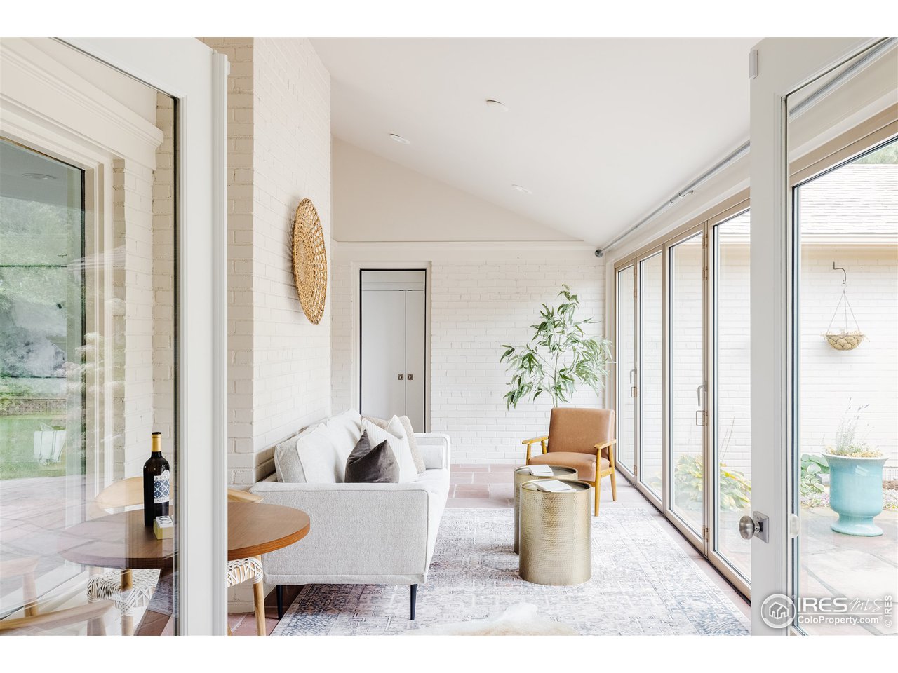 733 13th Street Boulder, CO 80302 - Photo 20 of 35 a living room with furniture and a window