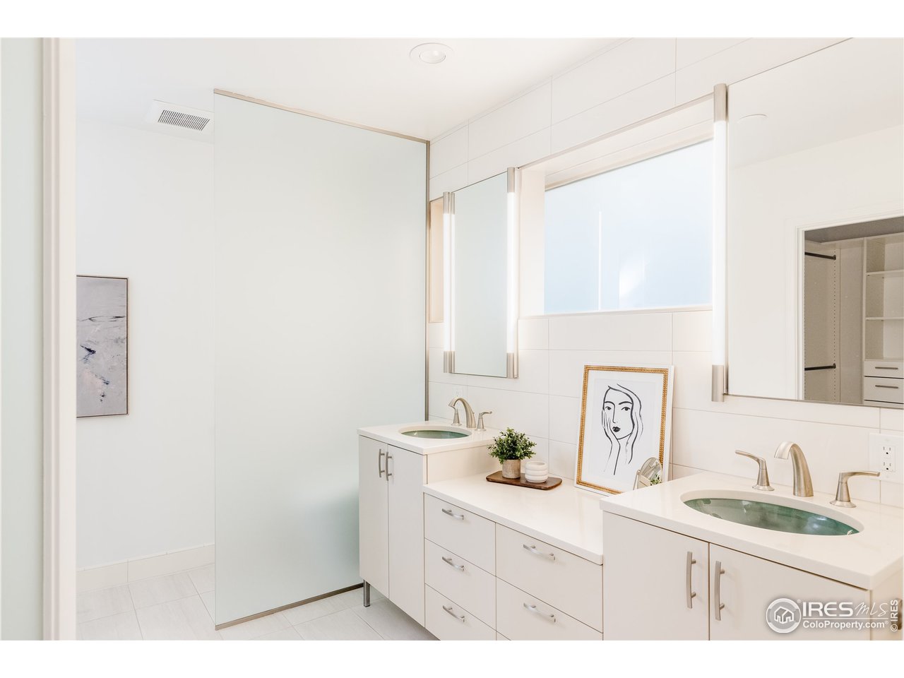 733 13th Street Boulder, CO 80302 - Photo 25 of 35 a bathroom with a sink and a mirror