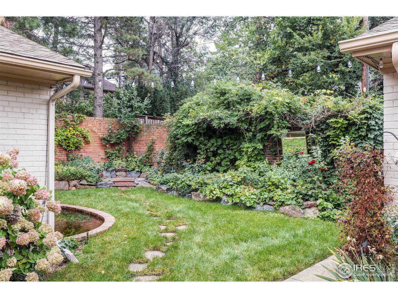 733 13th Street Boulder, CO 80302 - Photo 33 of 35 a view of a backyard with plants