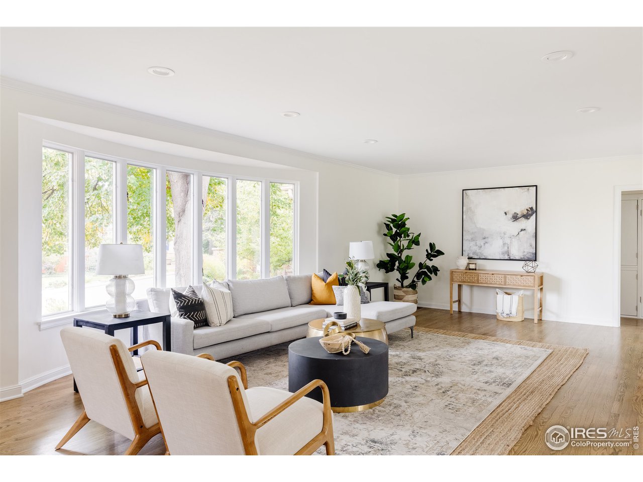733 13th Street Boulder, CO 80302 - Photo 9 of 35 a living room with furniture and a large window