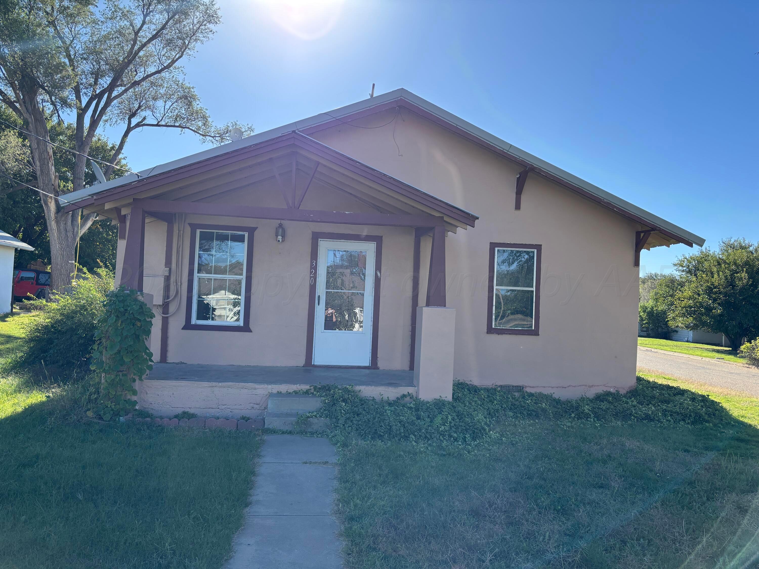320 West Summit Street Miami, TX 79059 - Photo 19 of 19 a front view of house with yard