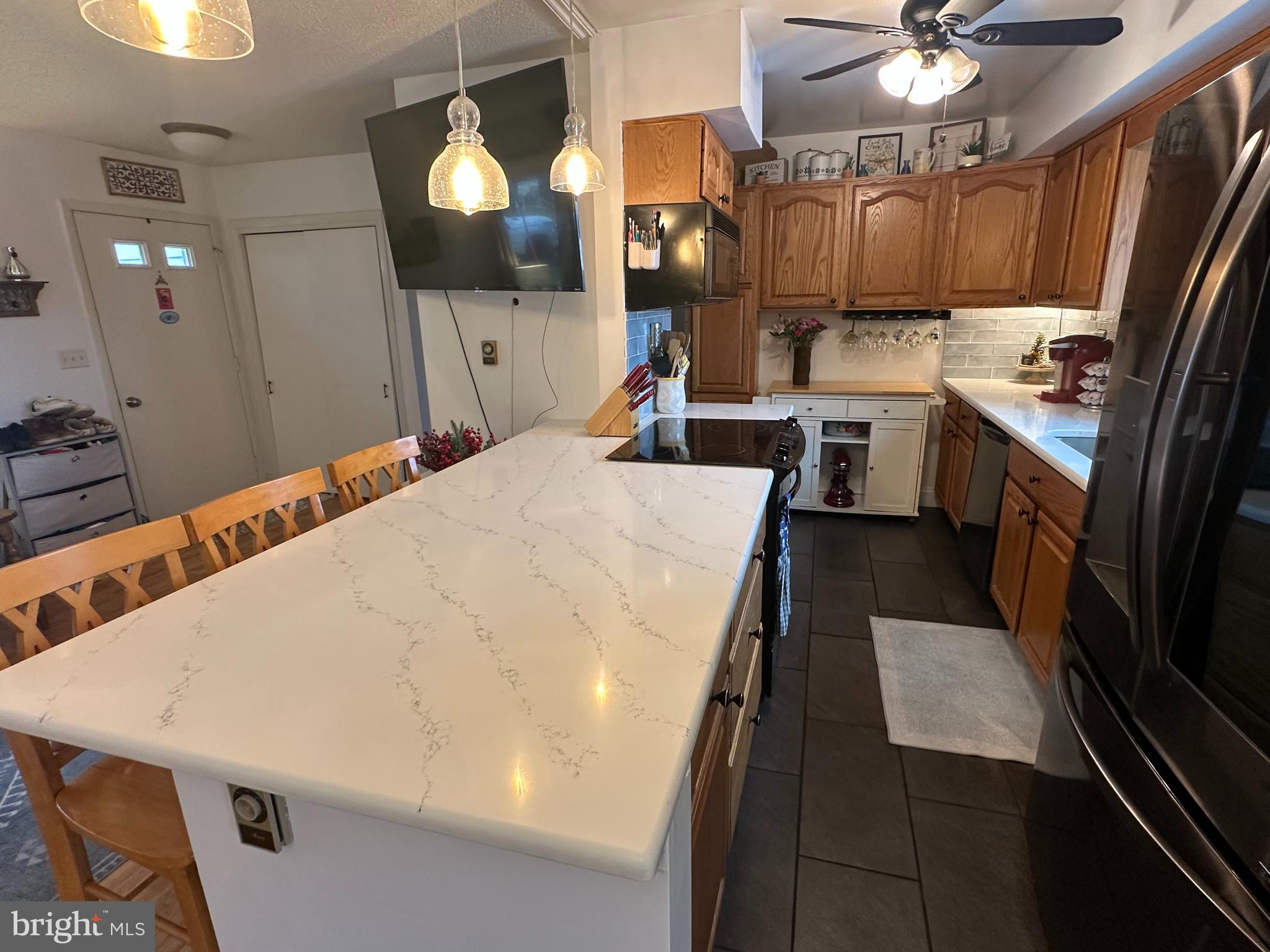 123 Ridge Avenue Centre Hall, PA 16828 - Photo 12 of 37 a kitchen with a sink appliances and cabinets