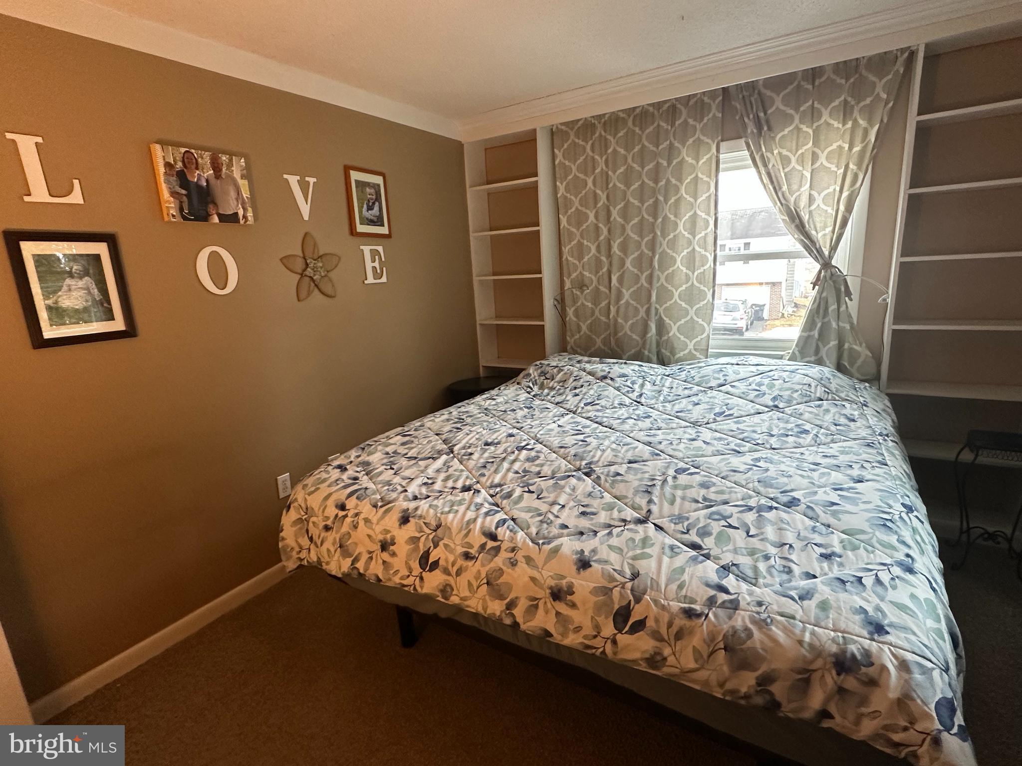123 Ridge Avenue Centre Hall, PA 16828 - Photo 19 of 37 a bed sitting in a bedroom next to a window and a dresser