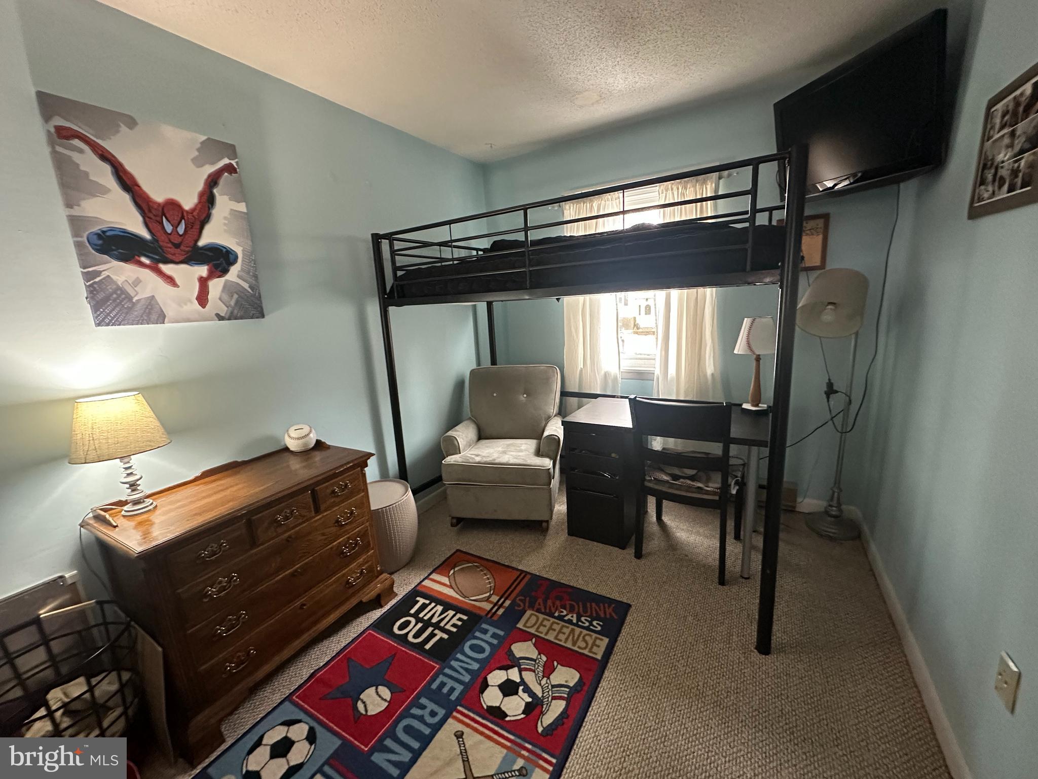 123 Ridge Avenue Centre Hall, PA 16828 - Photo 21 of 37 a bedroom with furniture and a lamp