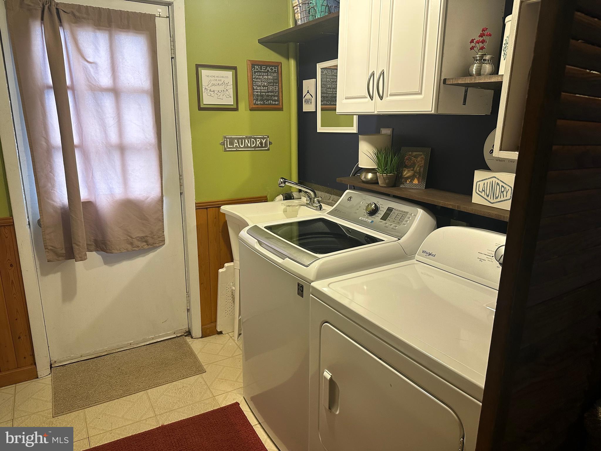 123 Ridge Avenue Centre Hall, PA 16828 - Photo 26 of 37 a utility room with dryer and washer