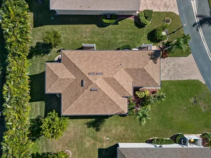 an aerial view of a house with a garden