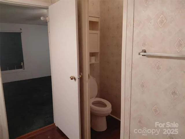a bathroom with a toilet