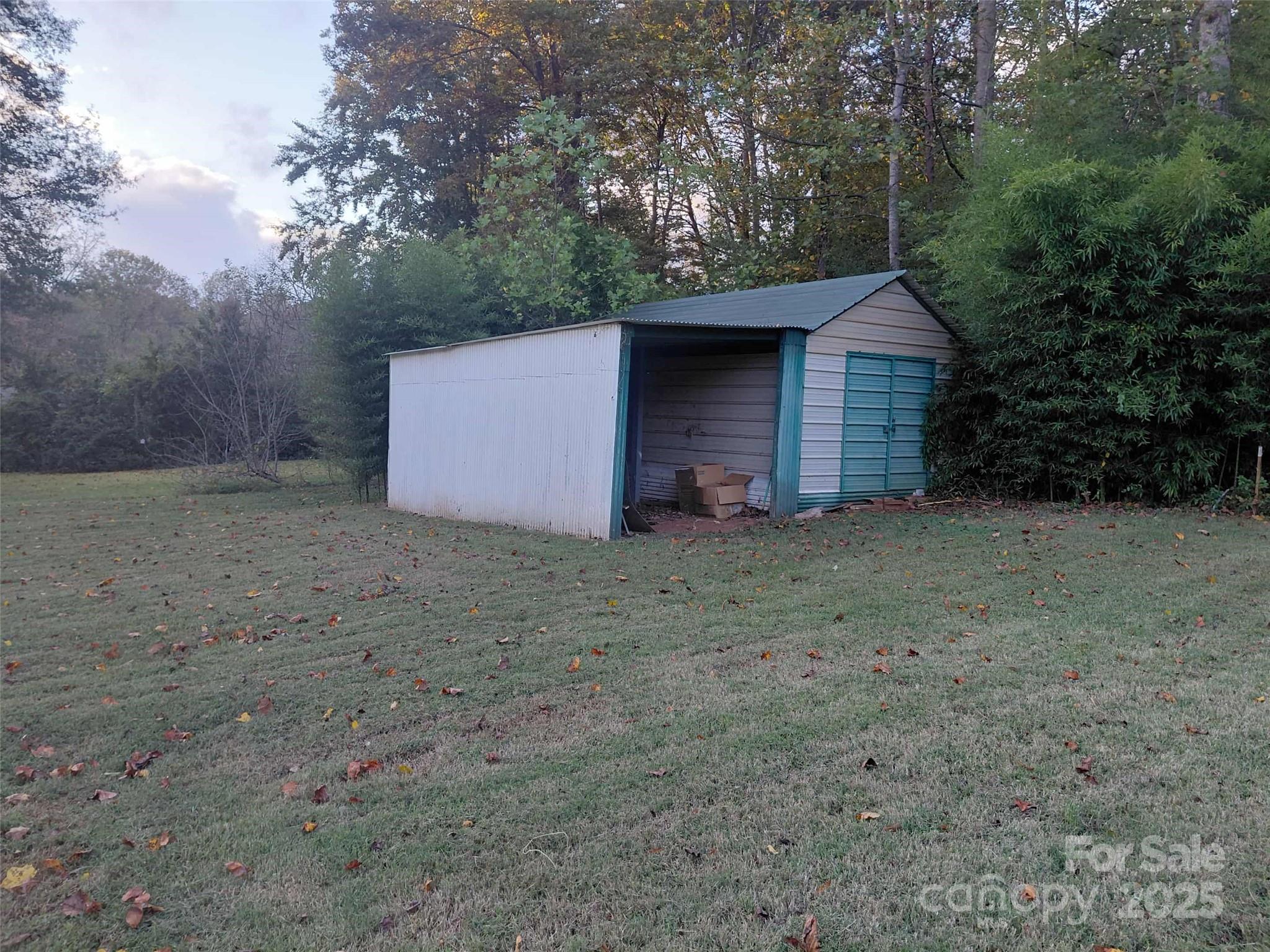 1900 Shady Lane Newton, NC 28658 - Photo 6 of 18 a front view of a house with a yard
