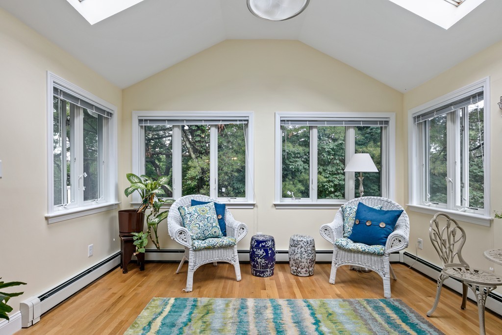 381 Lincoln Street Lexington, MA 02421 - Photo 16 of 35 a living room with furniture and large windows