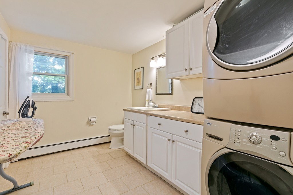 381 Lincoln Street Lexington, MA 02421 - Photo 30 of 35 a utility room with sink dryer and washer