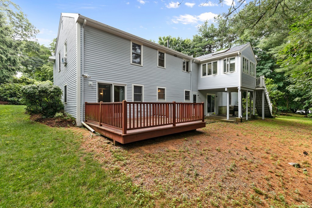 381 Lincoln Street Lexington, MA 02421 - Photo 35 of 35 a view of a house with a yard and deck