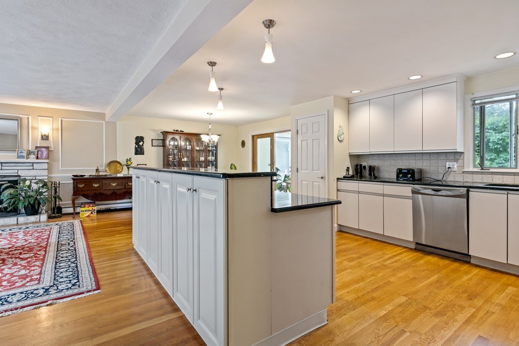381 Lincoln Street Lexington, MA 02421 - Photo 4 of 35 a large kitchen with cabinets