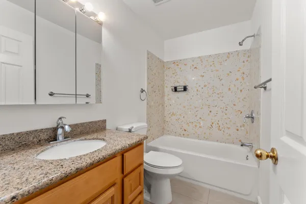 a room with a bed and a window