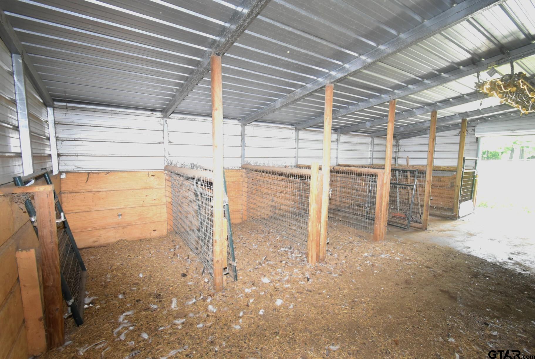 370 Spur 514 Yantis, TX 75497 - Photo 12 of 38 a view of a room with racks on the wall