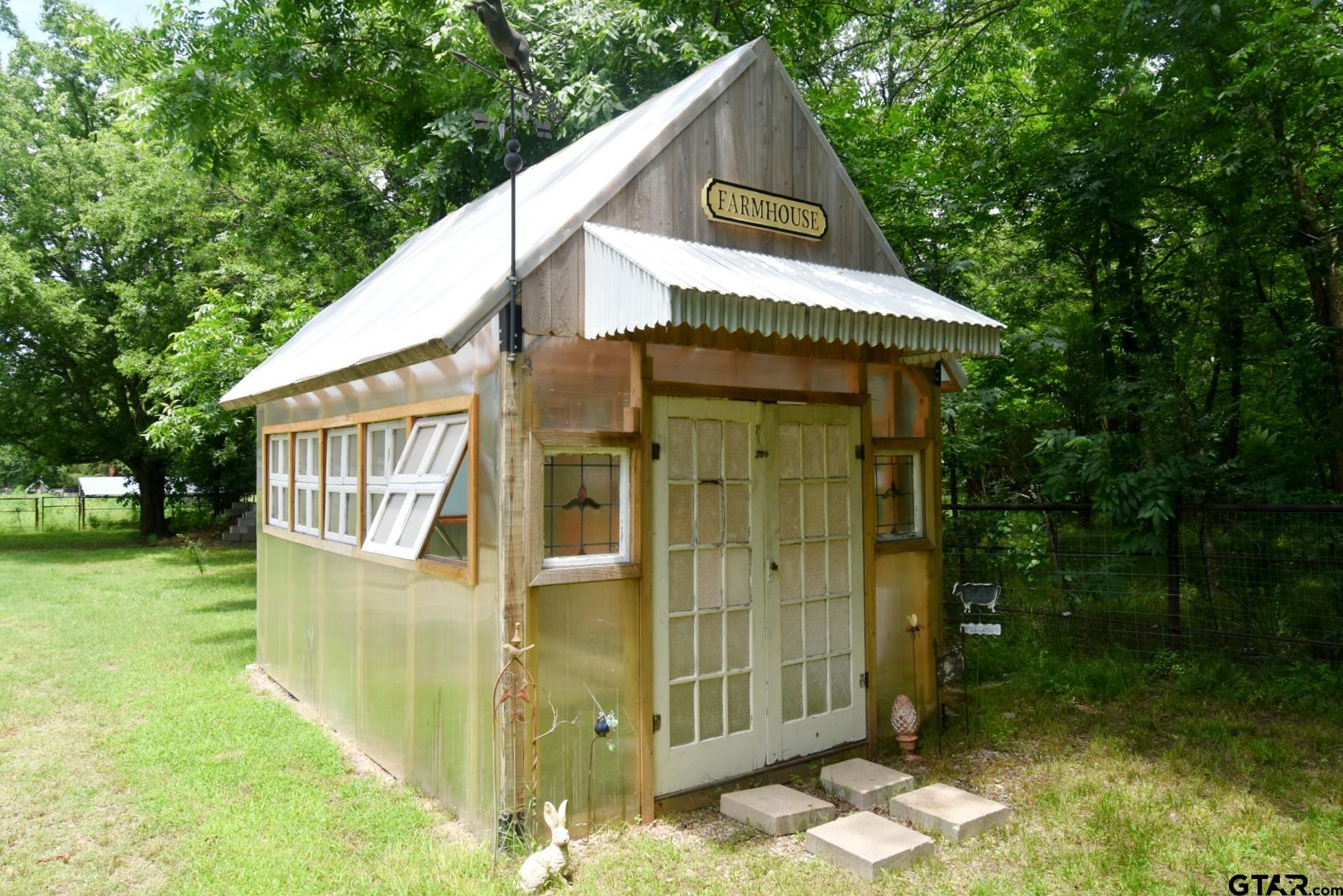 370 Spur 514 Yantis, TX 75497 - Photo 14 of 38 a view of a small house with yard