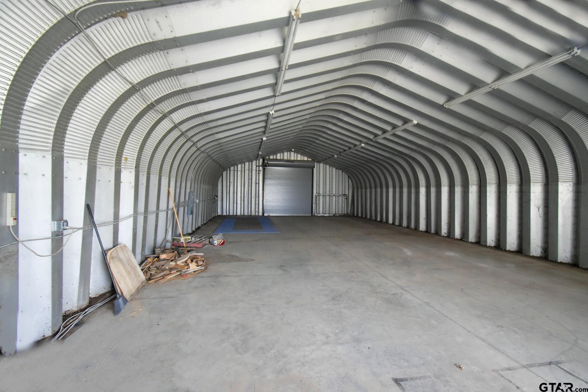 370 Spur 514 Yantis, TX 75497 - Photo 16 of 38 a view of a garage with stairs