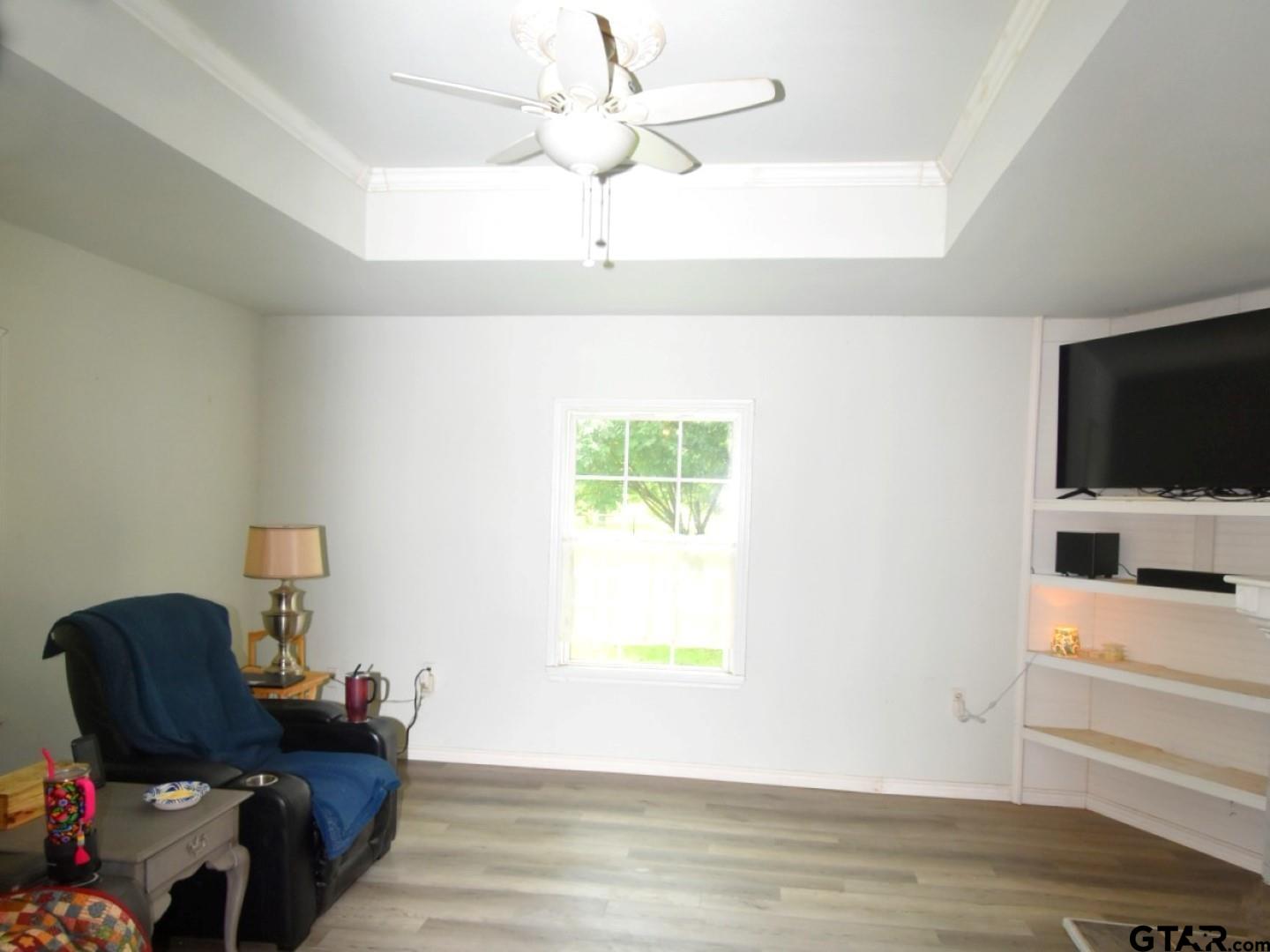 370 Spur 514 Yantis, TX 75497 - Photo 19 of 38 a living room with furniture and a flat screen tv