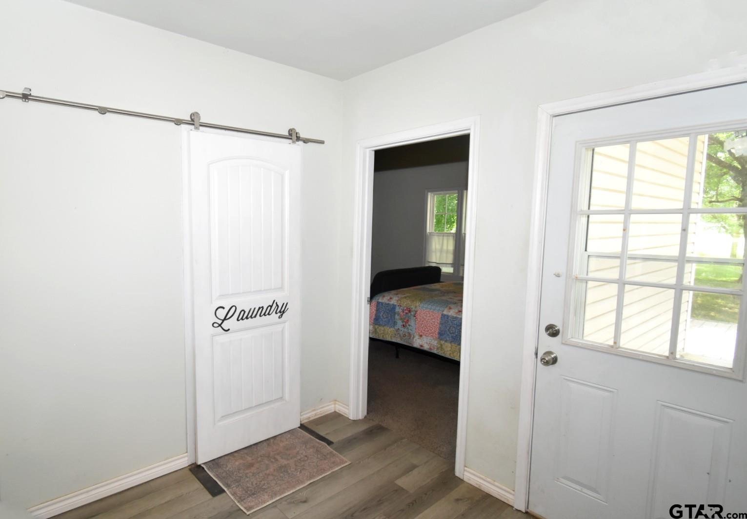 370 Spur 514 Yantis, TX 75497 - Photo 32 of 38 a view of utility room and bedroom