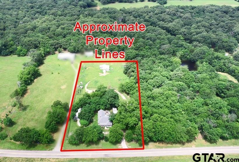 370 Spur 514 Yantis, TX 75497 - Photo 34 of 38 a sign that is on a street