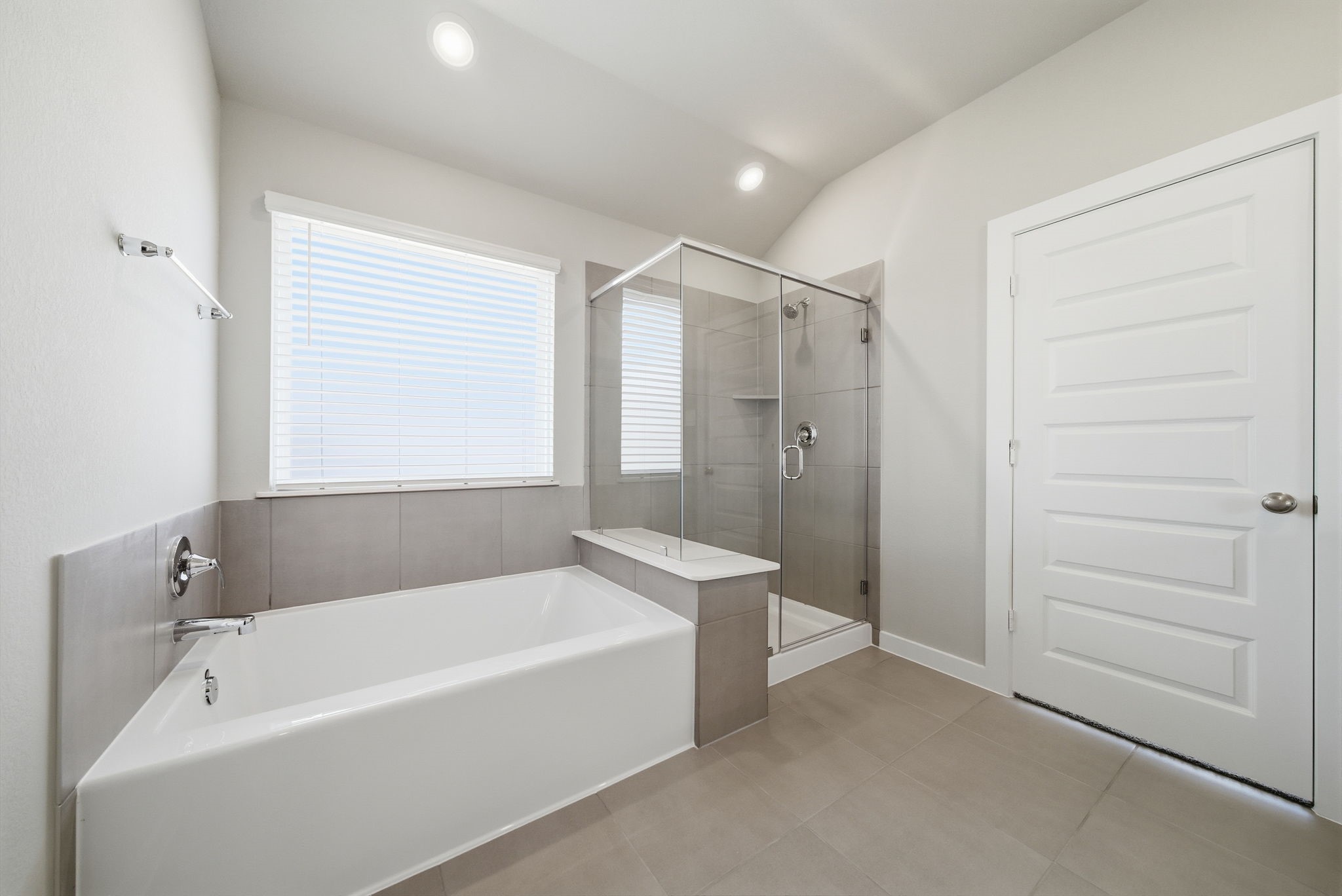 2606 Good Morrow Drive Rosenberg, TX 77471 - Photo 12 of 23 a bathroom with a bathtub and a shower