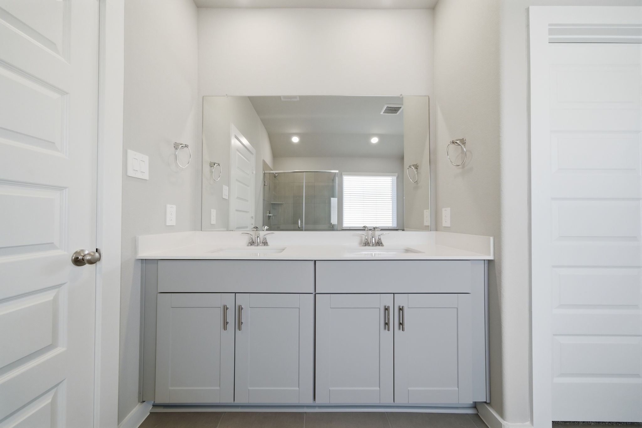 2606 Good Morrow Drive Rosenberg, TX 77471 - Photo 13 of 23 a bathroom with a double vanity sink and mirror
