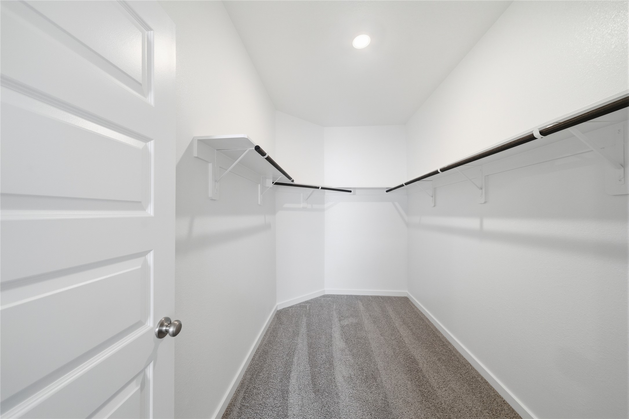 2606 Good Morrow Drive Rosenberg, TX 77471 - Photo 14 of 23 a view of a room with racks on the wall