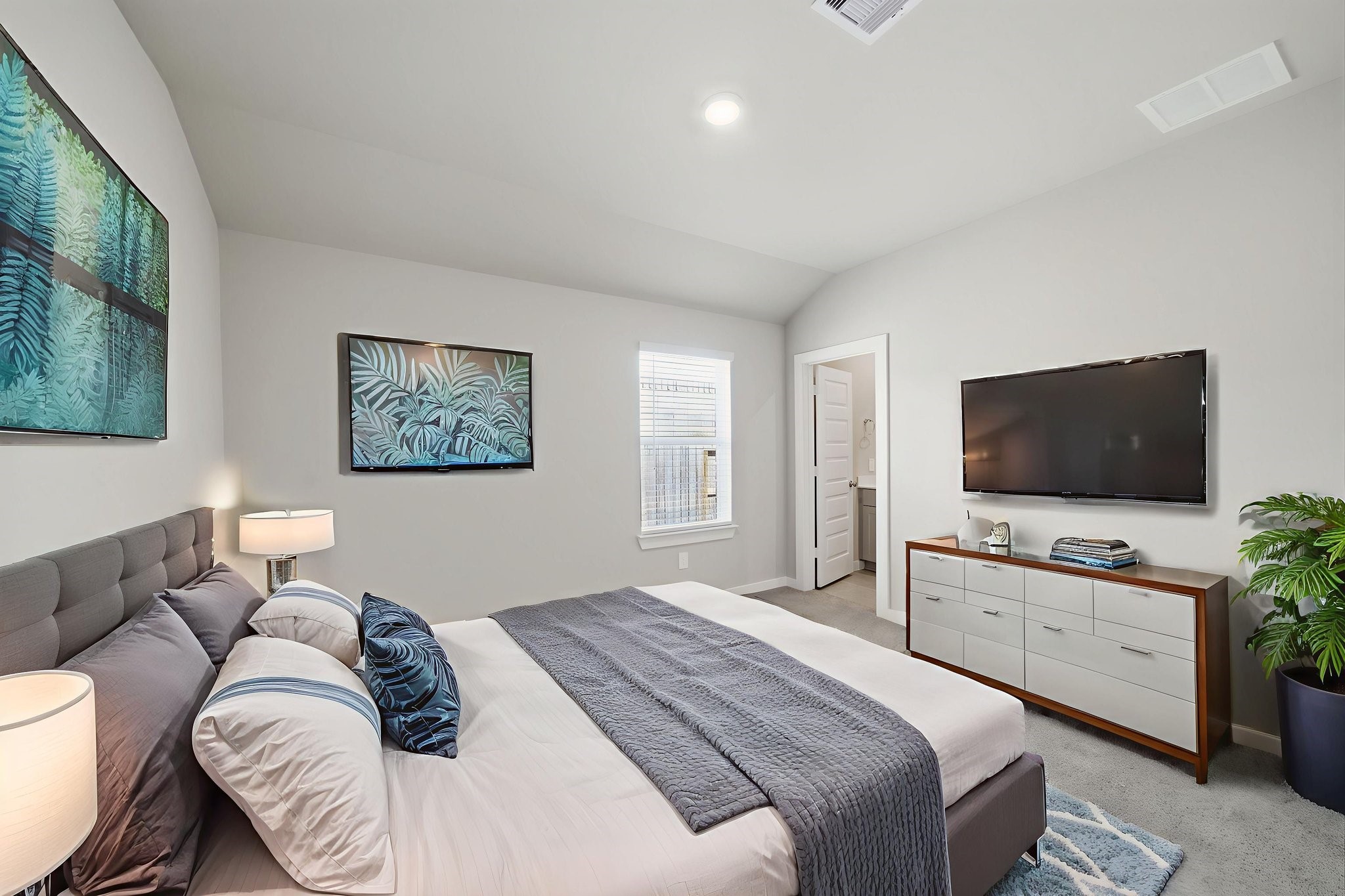 2606 Good Morrow Drive Rosenberg, TX 77471 - Photo 17 of 23 a bedroom with a bed and a flat screen tv