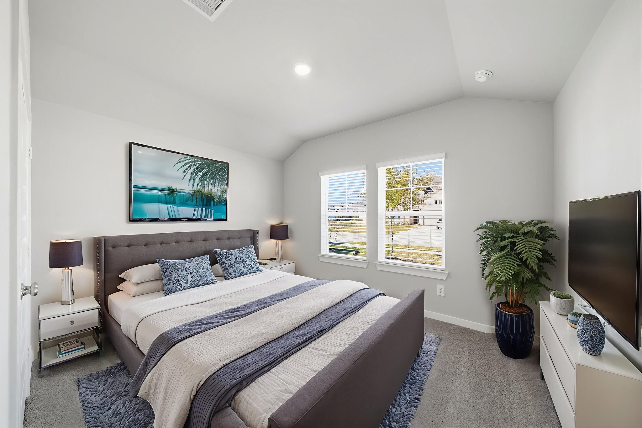 2606 Good Morrow Drive Rosenberg, TX 77471 - Photo 10 of 23 a bedroom with a bed and a flat screen tv