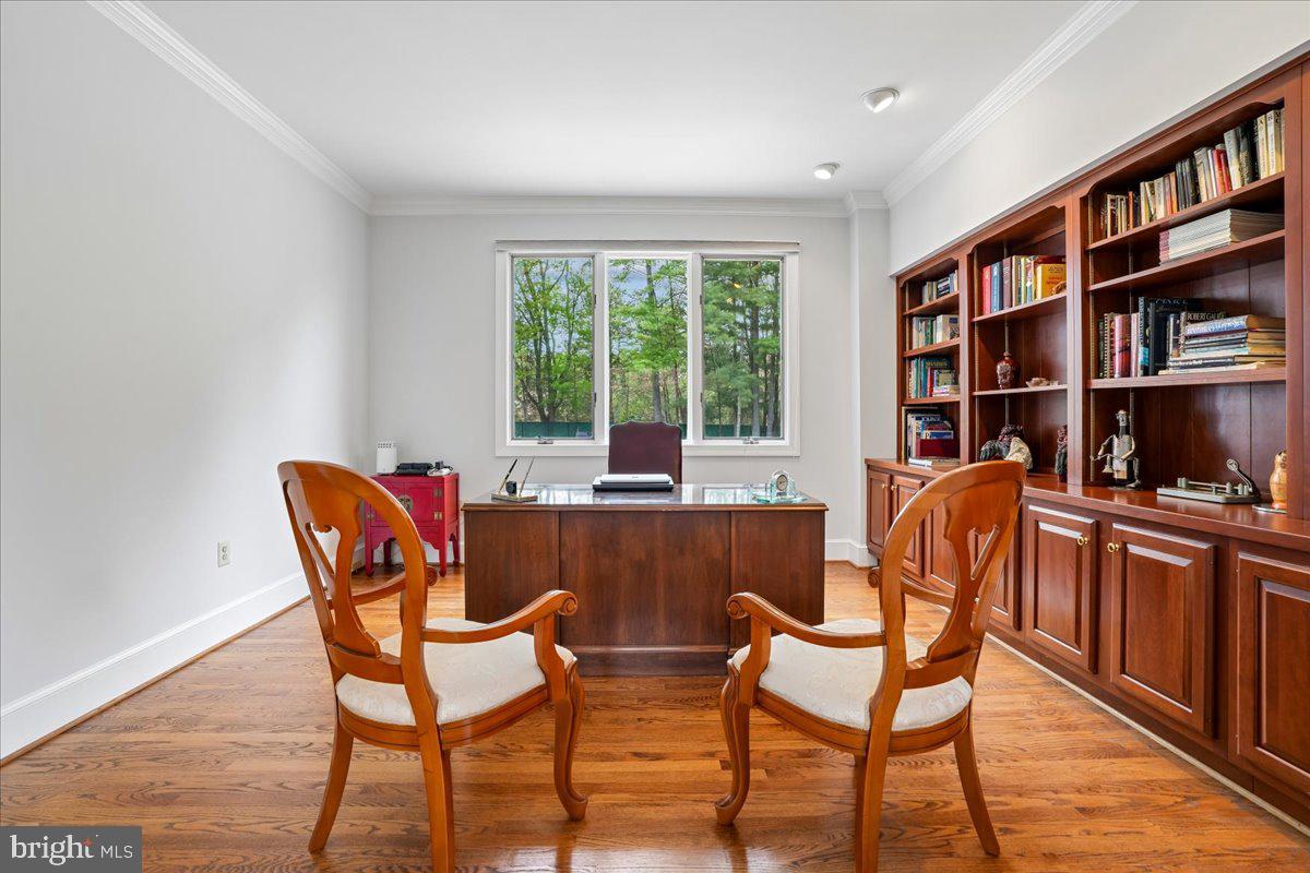 12640 Travilah Road Potomac, MD 20854 - Photo 11 of 56 Your office with built in library wall and backyar