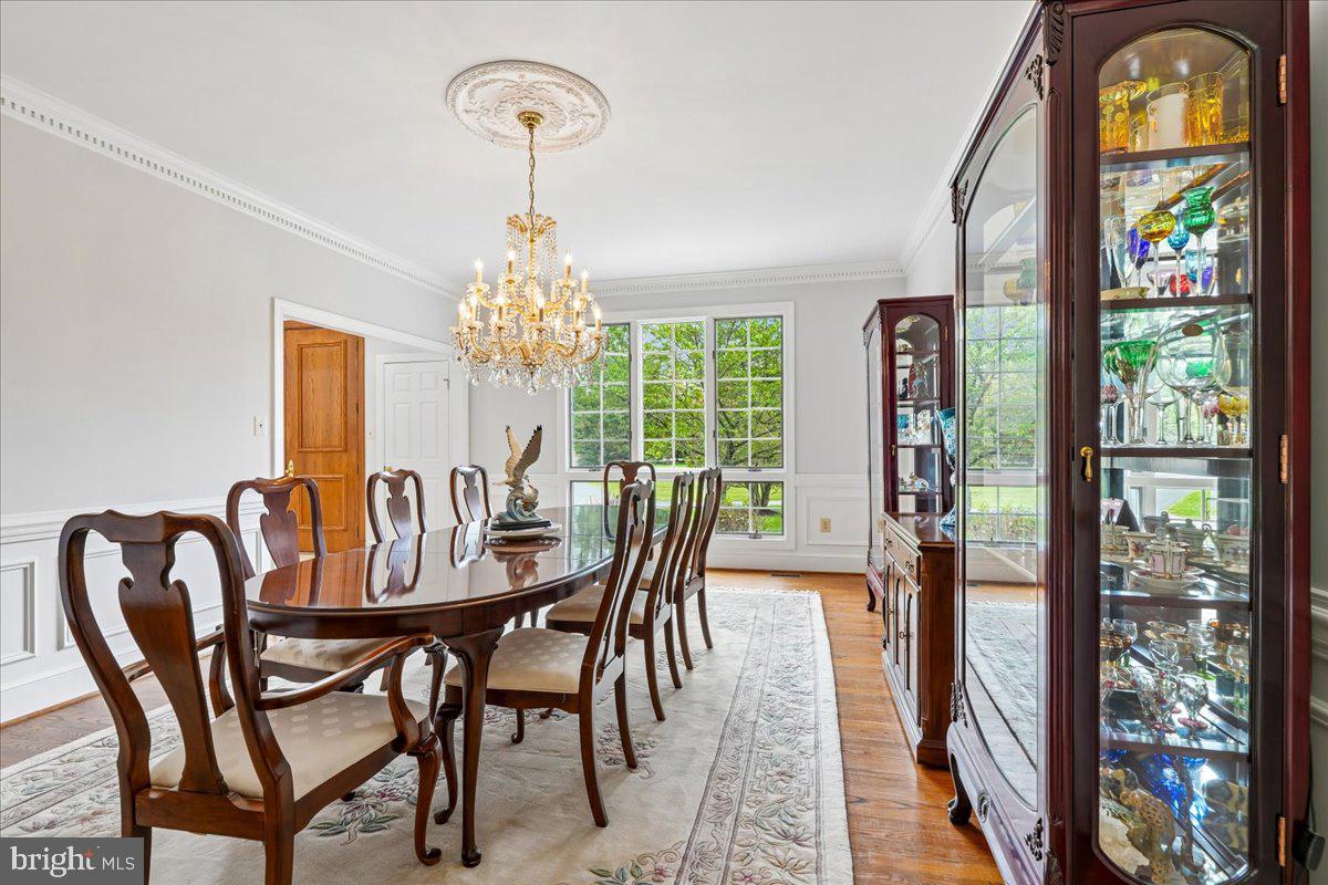 12640 Travilah Road Potomac, MD 20854 - Photo 14 of 56 Formal dining w/crown molding, wainscoting