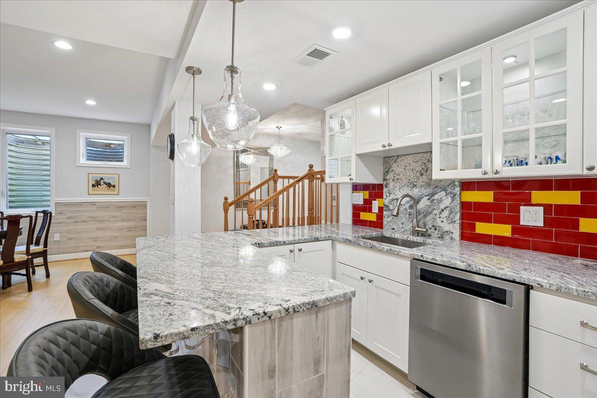 12640 Travilah Road Potomac, MD 20854 - Photo 45 of 56 Kitchenette and Bar in Fantastic Basement